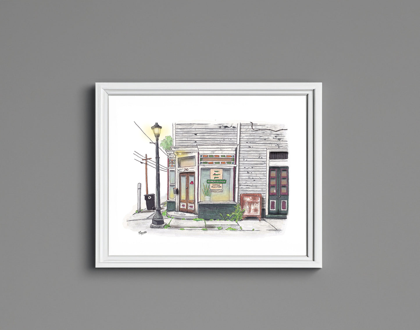 A framed product photo of the Congregation Coffee Shop art print. The finished piece in a simple white frame hangs on a slate colored wall. The image which floats on a white background matches the white frame.