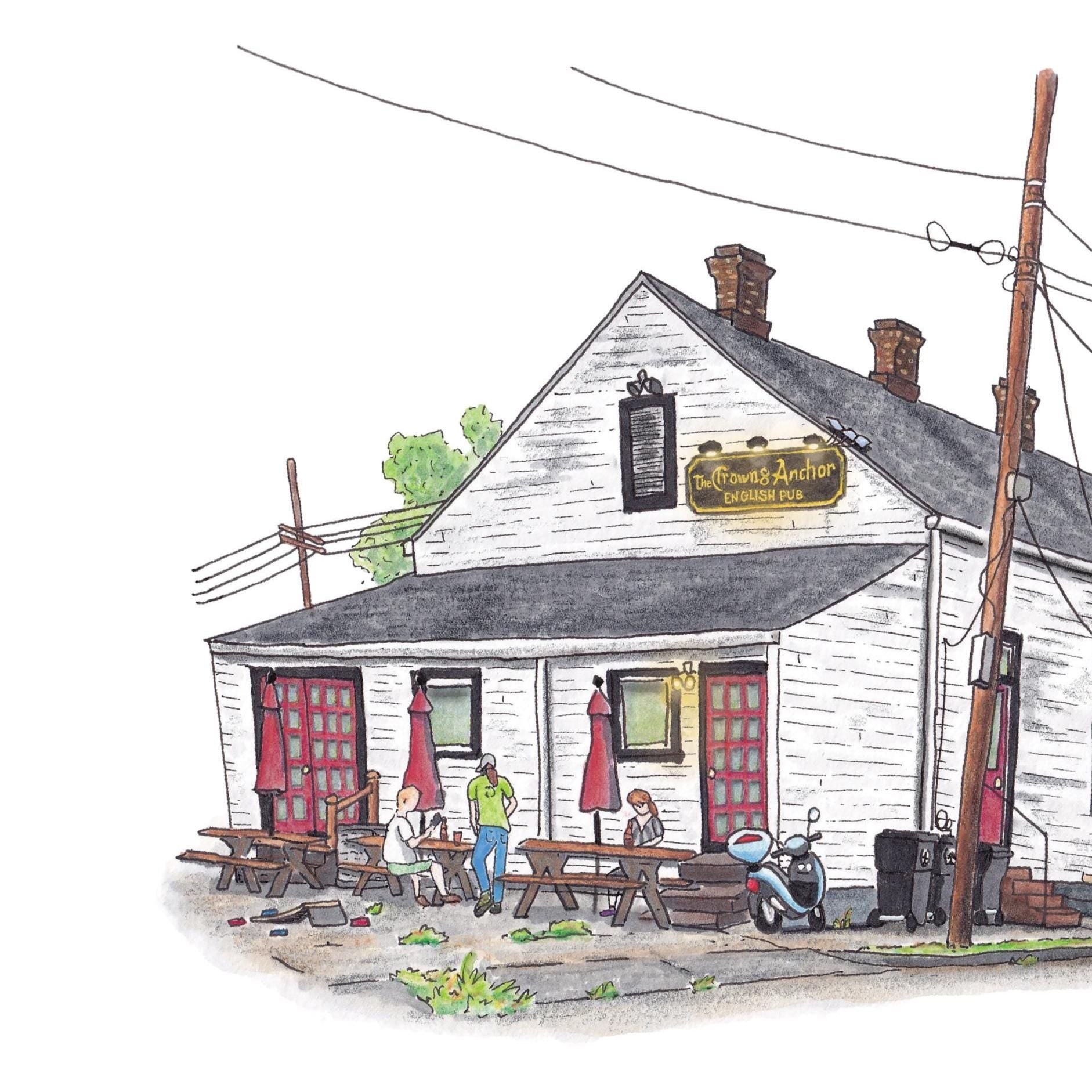 A detail photo of the Crown and Anchor Pub art print. A white building with red & black trim and a high pitched roof faces you with a 2 point perspective. 3 chimneys sit on the top of the roof. Power lines, sidewalk, picnic tables, and local patrons surround the building. A black sign with gold, old English style lettering illuminated by three overhead lights reads "The Crown and Anchor English Pub". The image floats on a white background.