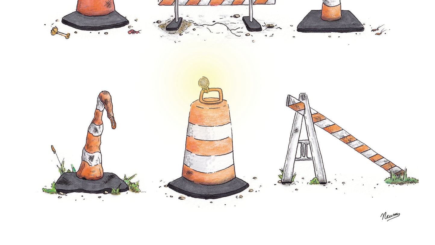 Detail of the bottom row of three cones: from left to right; A terribly beaten slender orange and white cone. Next, a construction barrel with a glowing light affixed to its top. Lastly, an A frame, one legged orange and white barrier.
