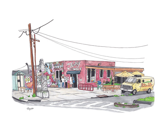 A product photo of the Turkey and the Wolf art print. A red brick building has the signage "Turkey and the Wolf" painted directly on the brick above the door in white. Patrons eat at tables outside and line out the door waiting for service. A mural covers the lefts side of the eatery while a power pole and a community fridge flank the left. Out front is a van owned by the restaurant called the "Cat Scratch Fever". It's yellow with lions painted on the side with a port window.